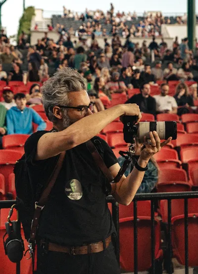 Diego Cerquera photographing a live event at St. Augustine Amphitheatre
