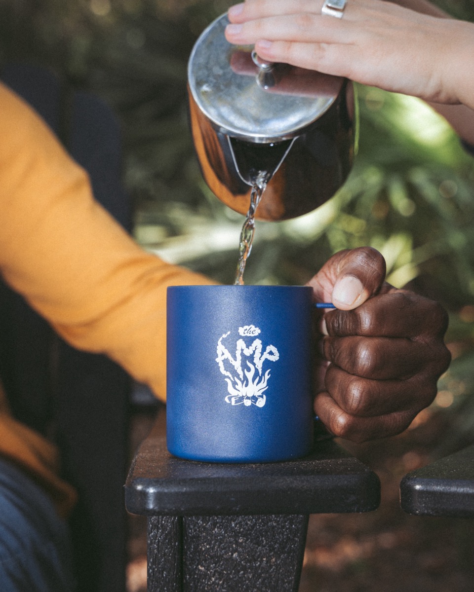 Coffee poured into a The Amp enamel camp mug, St. Augustine Amphitheatre
