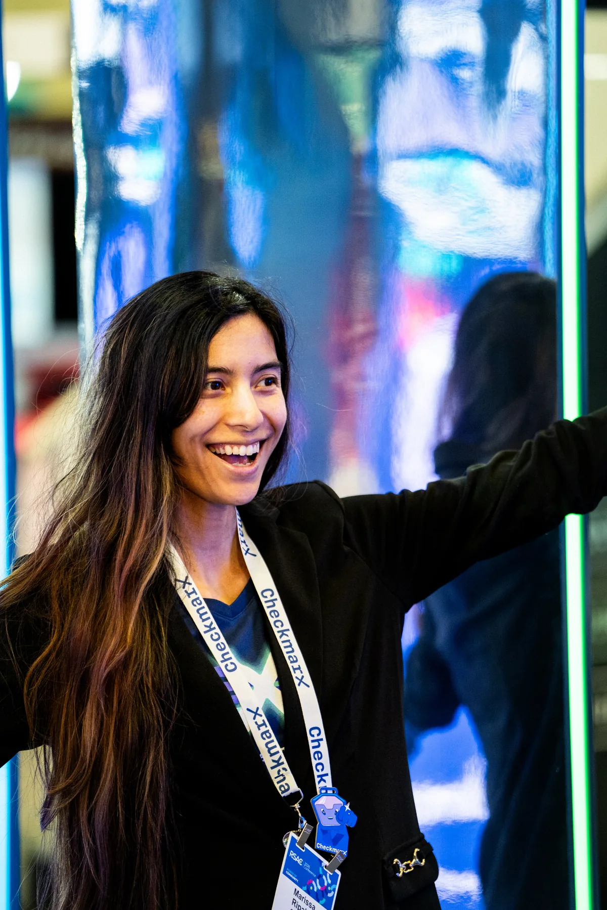 Attendee at a sponsor booth during the RSAC conference — First Sight Films corporate event photography