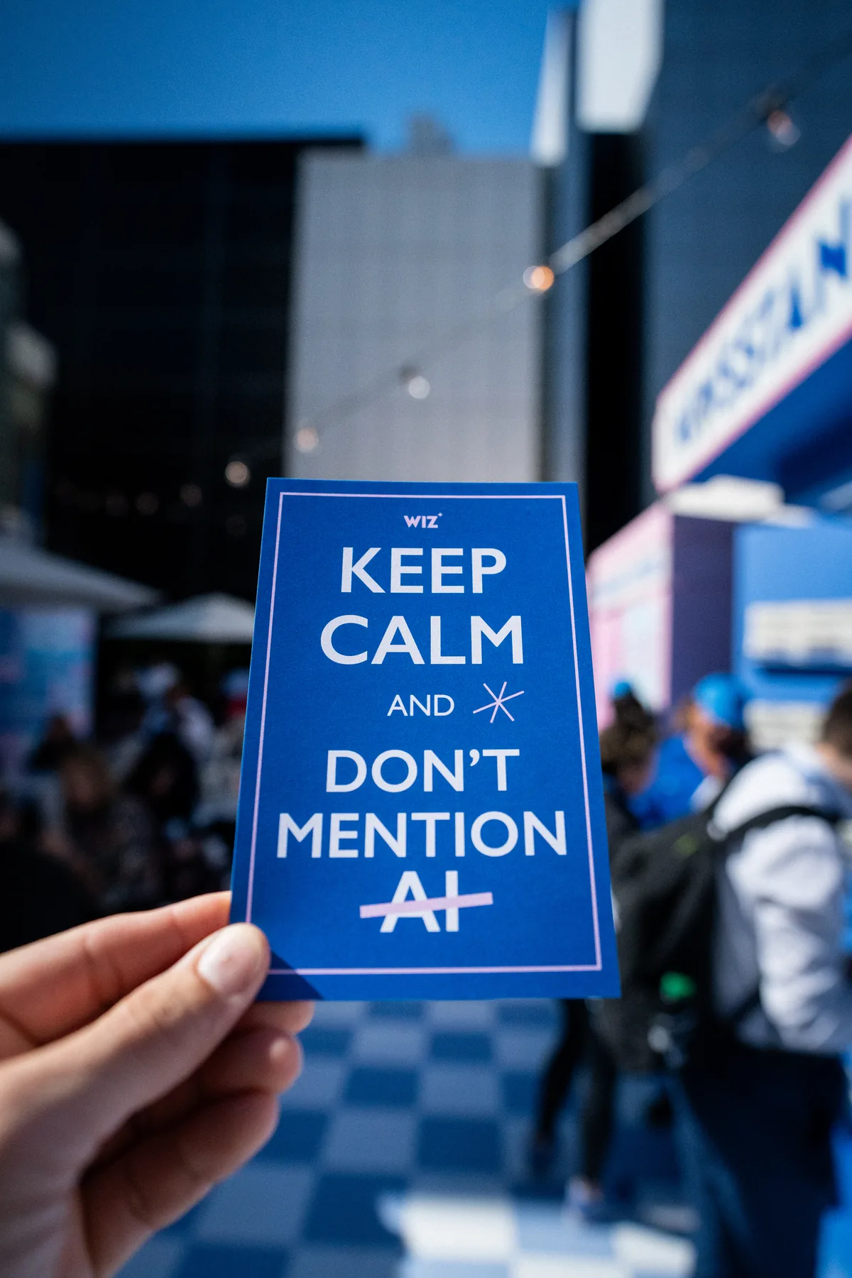 Wiz Keep Calm sponsor giveaway card at RSAC 2026 in San Francisco, CA — First Sight Films corporate event photography