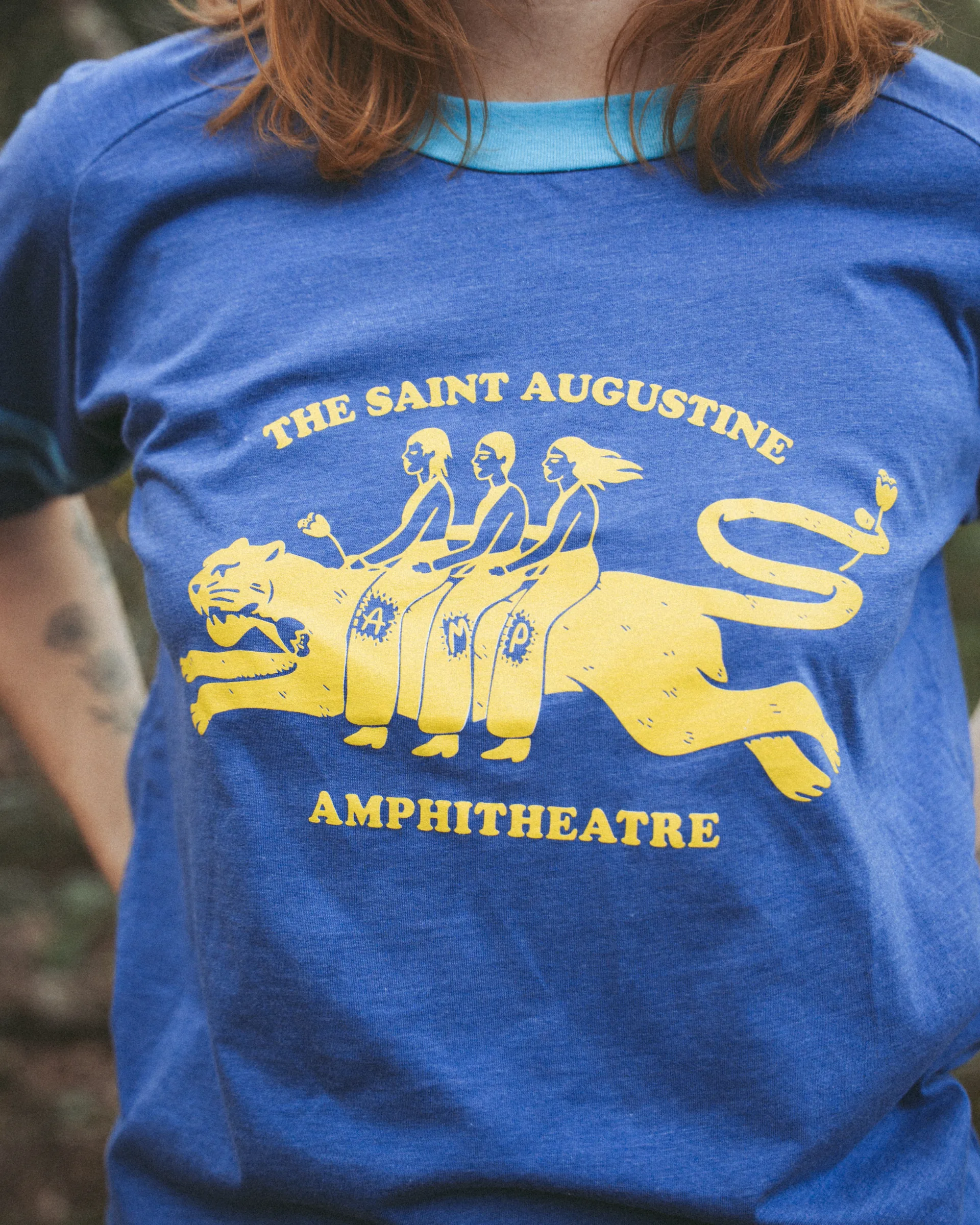 Saint Augustine Amphitheatre lion graphic tee worn on location