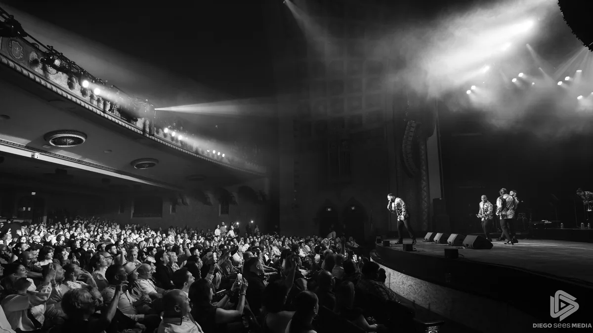 Grupo Niche performing on stage at the Florida Theatre, Jacksonville, photographed by First Sight Films