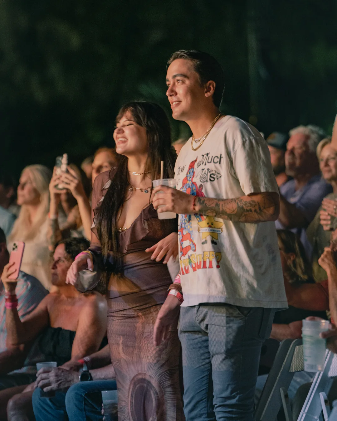 First Sight Films photography of a couple in the audience at the St. Augustine Amphitheatre