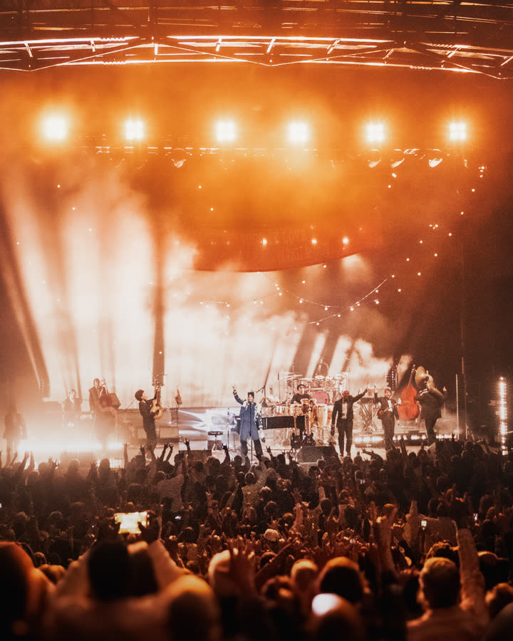 First Sight Films photography of Jon Batiste performing to the crowd at the St. Augustine Amphitheatre